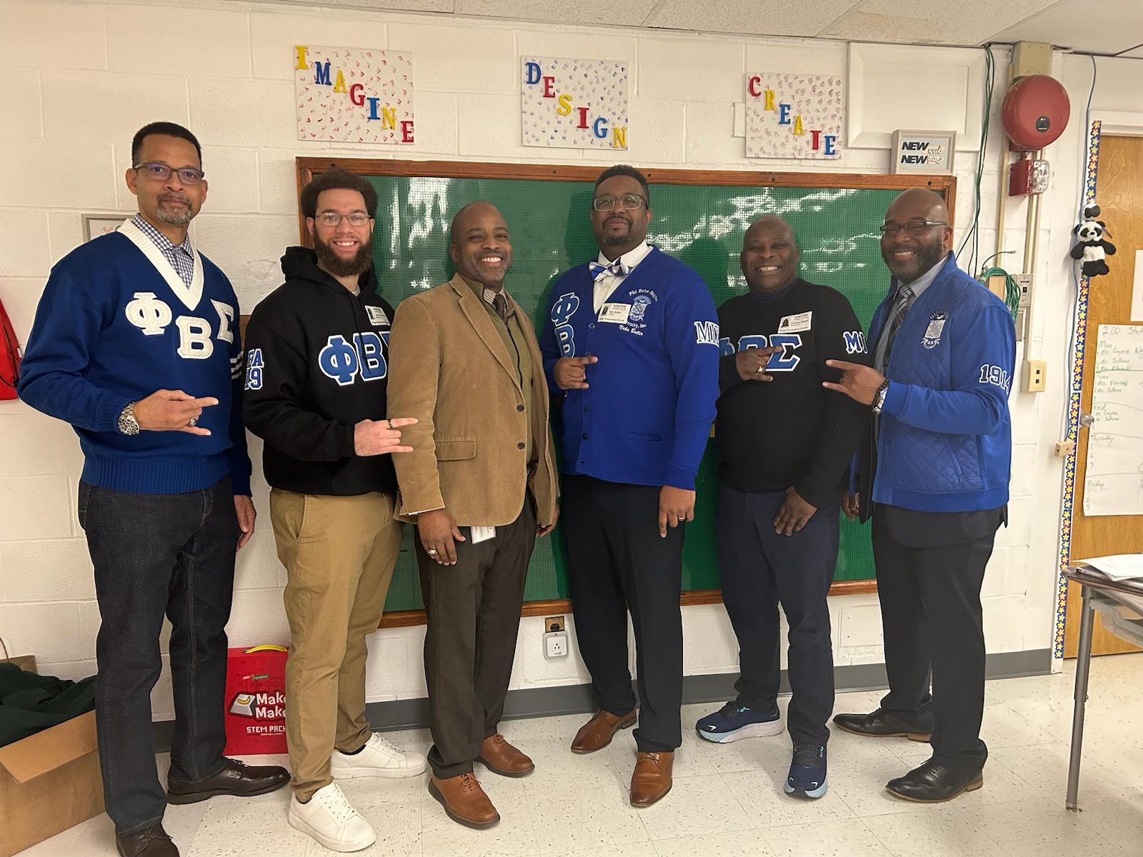 Dr. Shaun Mason and his brothers of the Phi Beta Sigma (ΦΒΣ) fraternity came to Paige talk about American agricultural scientist and inventor, George Washington Carver.