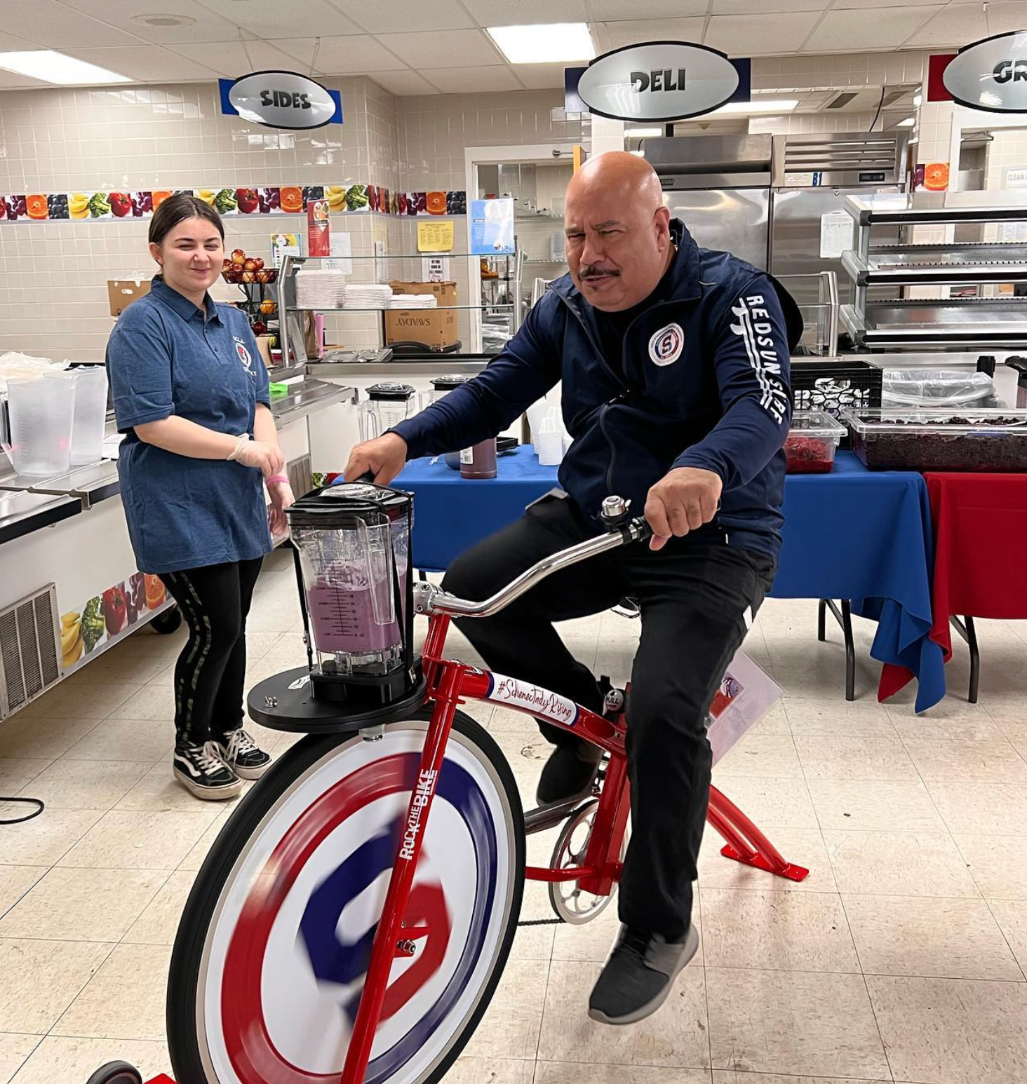 Alex Torres on Smoothie blender bike at wellness fair