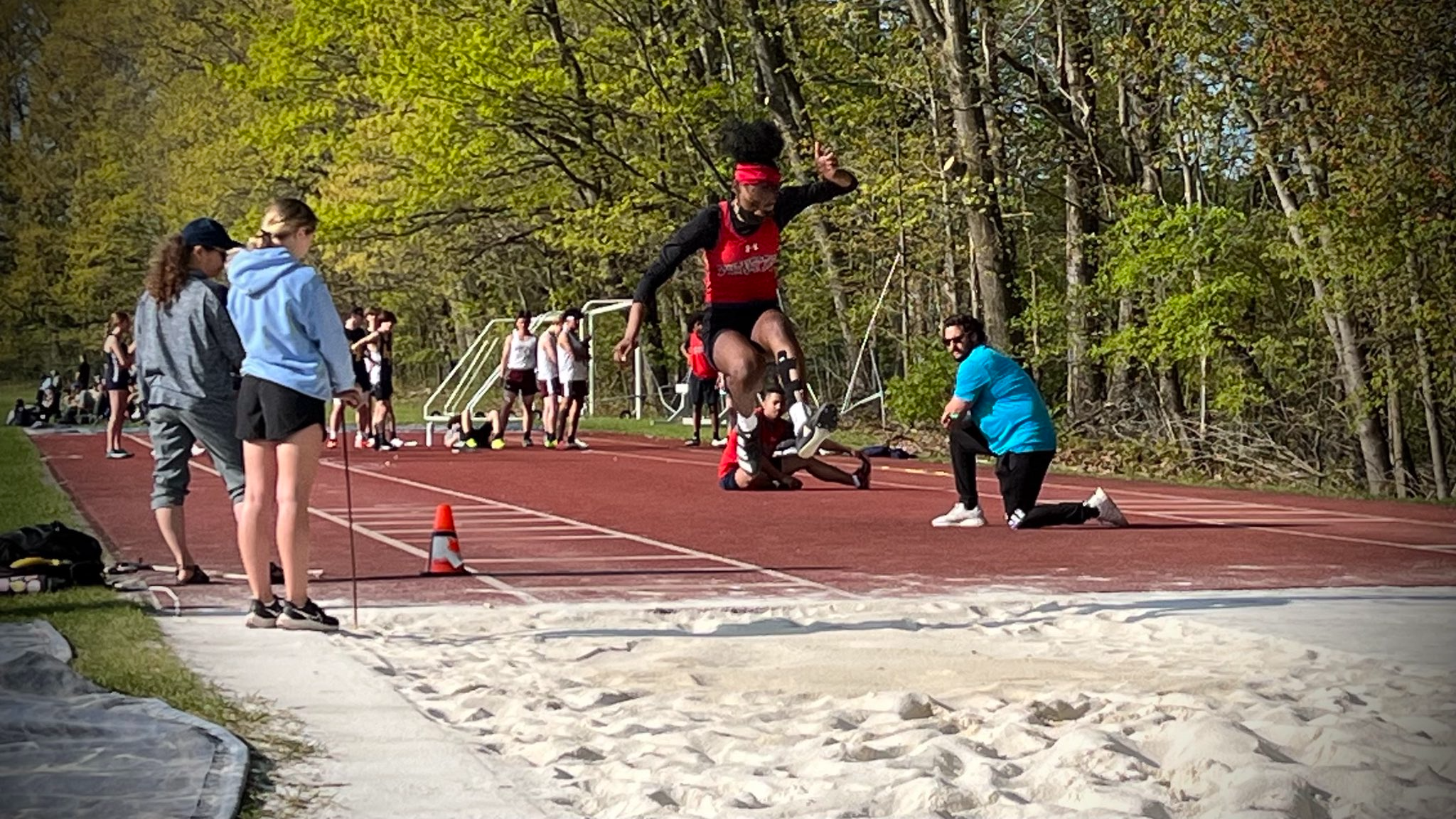 Long Jump athlete in mid air