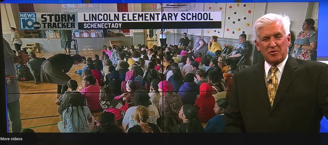 Photo of Steve Caporizzo at Lincoln Elementary School with link to video