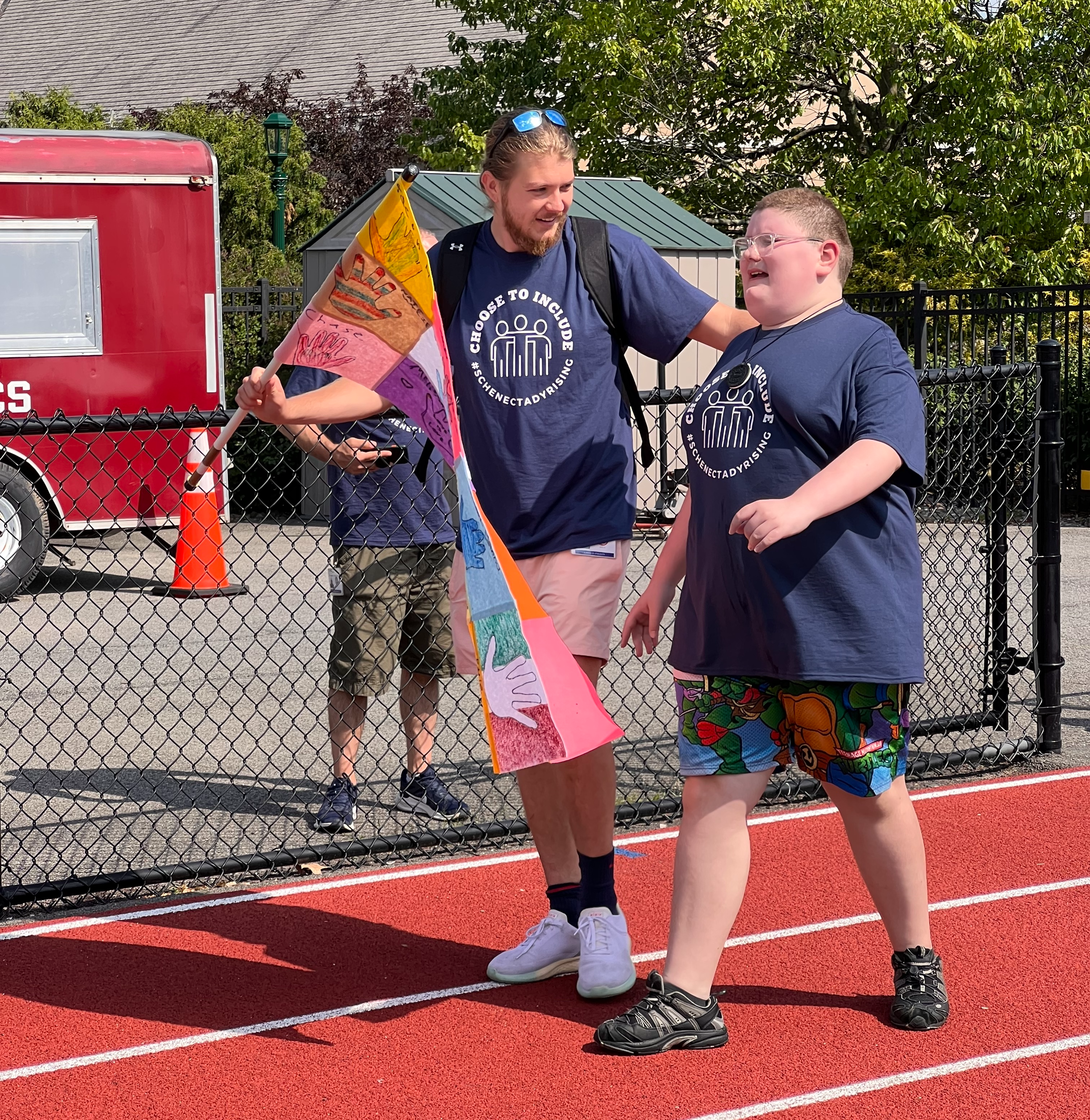 Student parades with TA