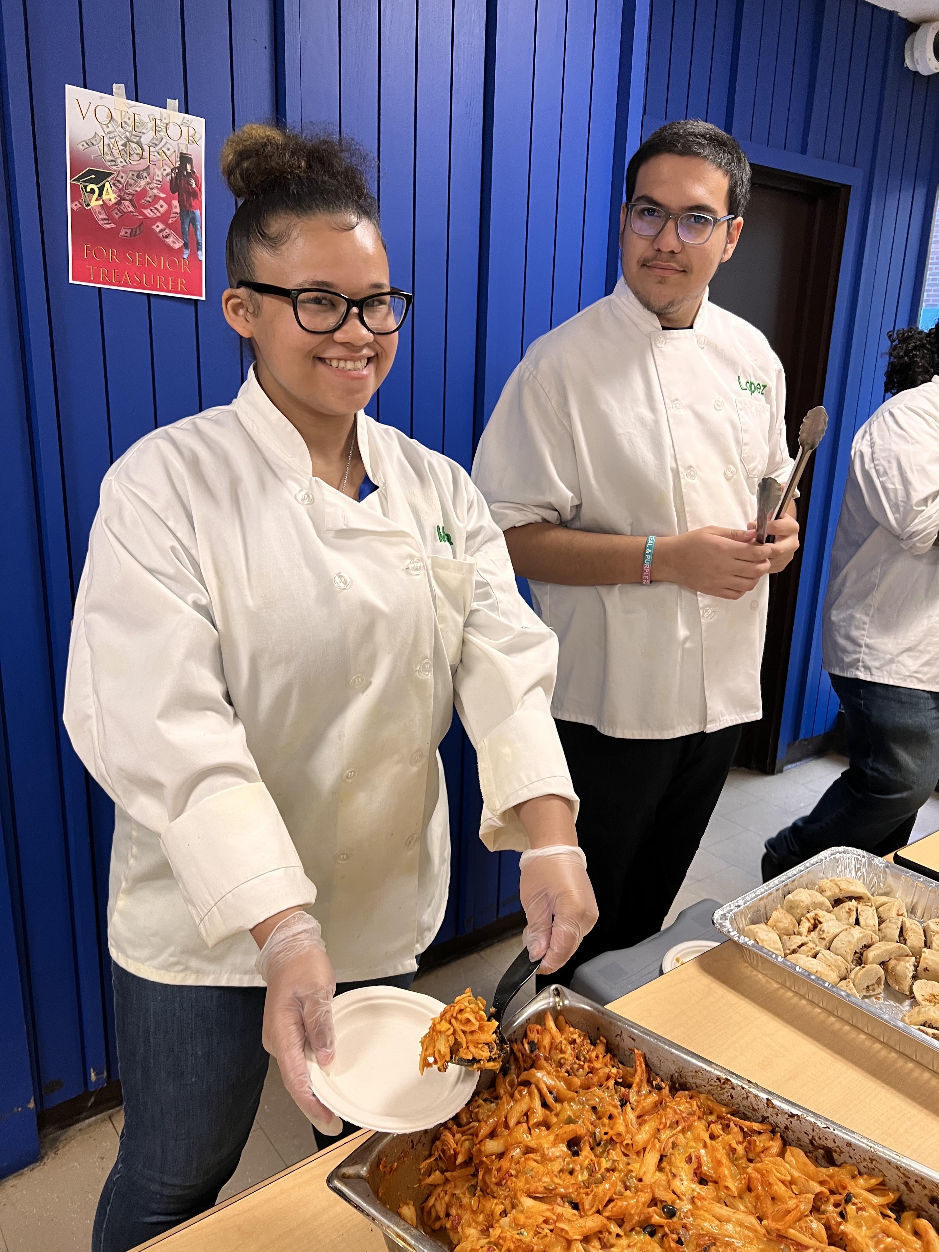 students serves food