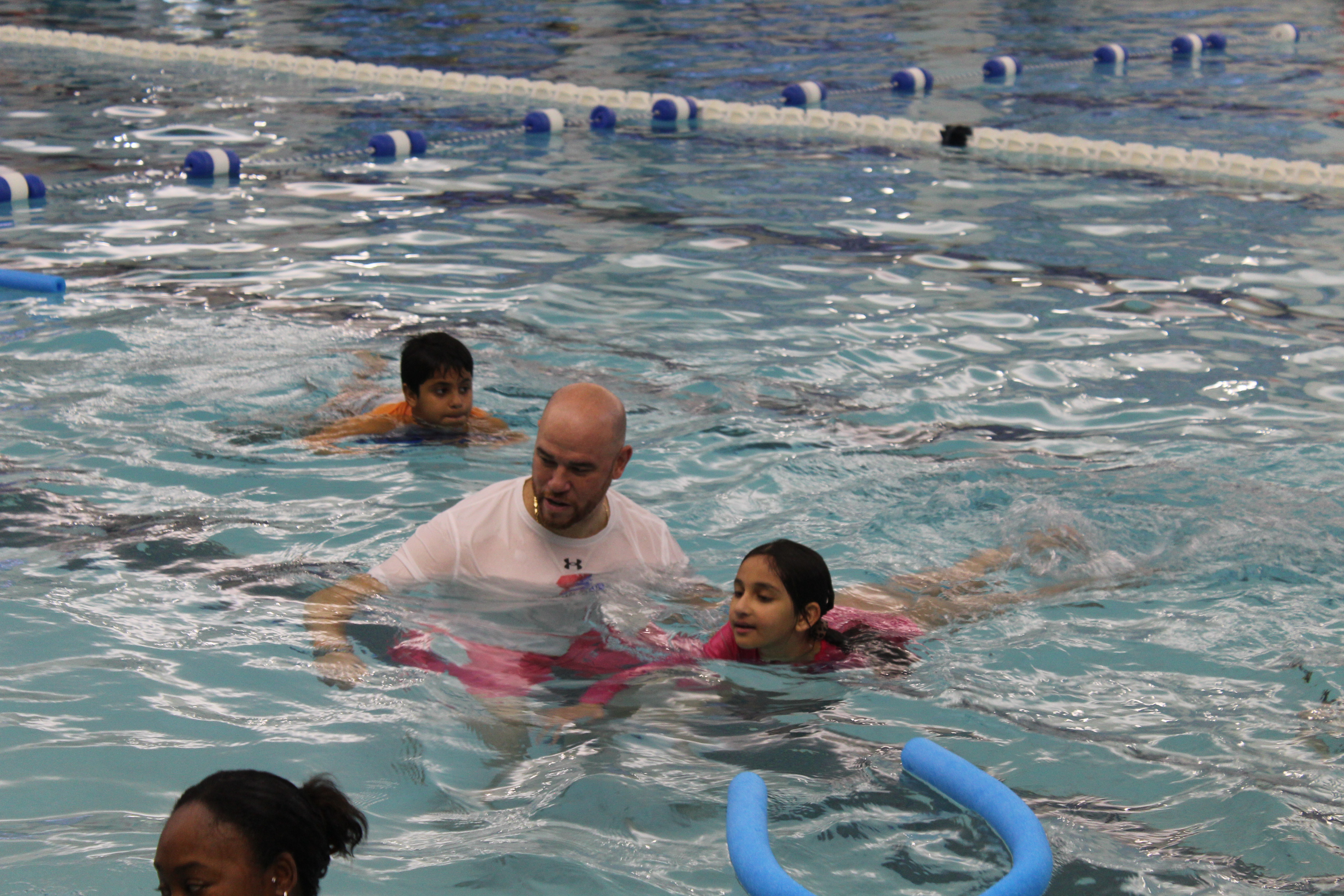 PHOTO:  Supt Soler swimming with 3rd graders