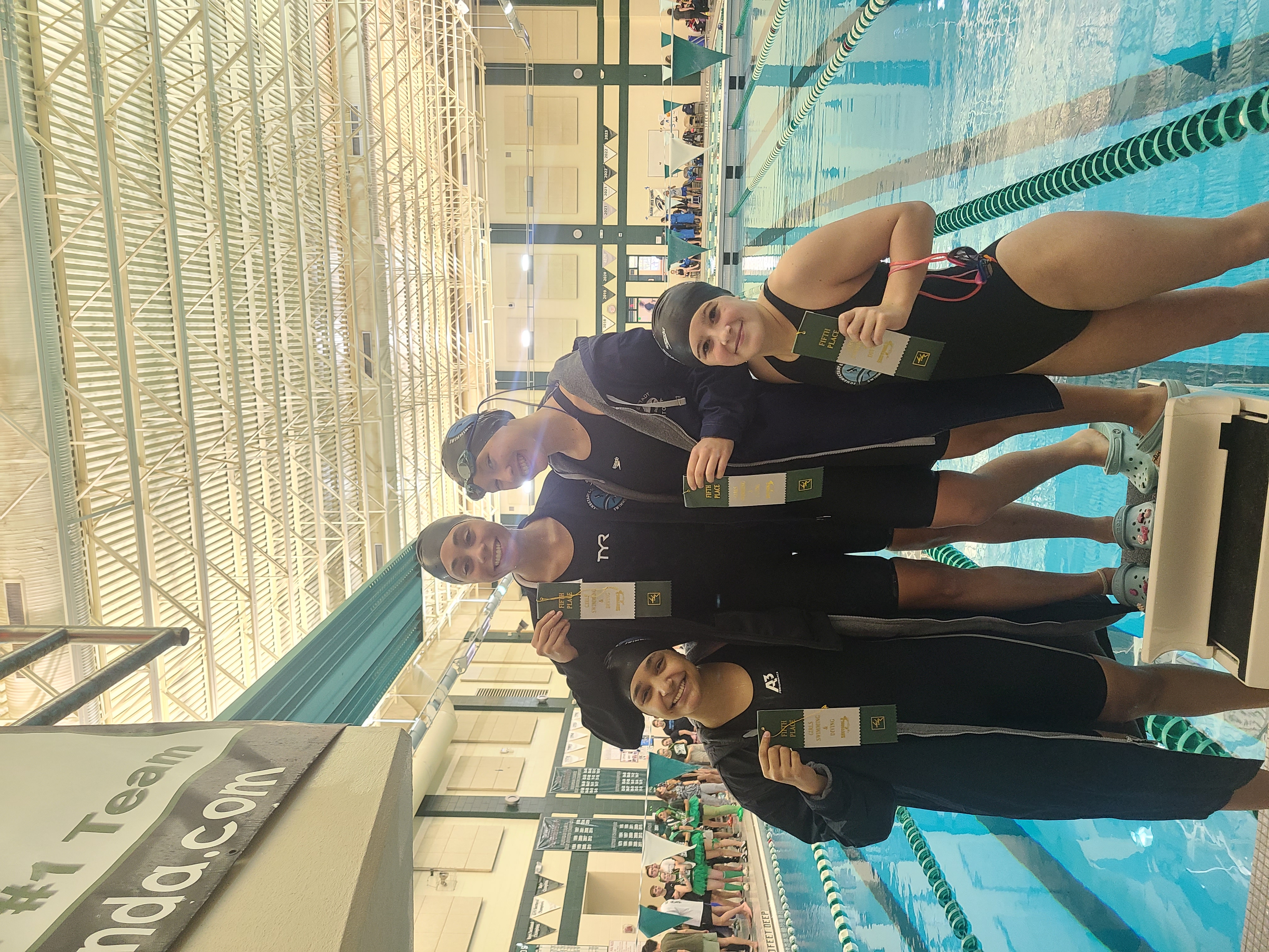 Photo:   Swimmers in the Sectional med relay