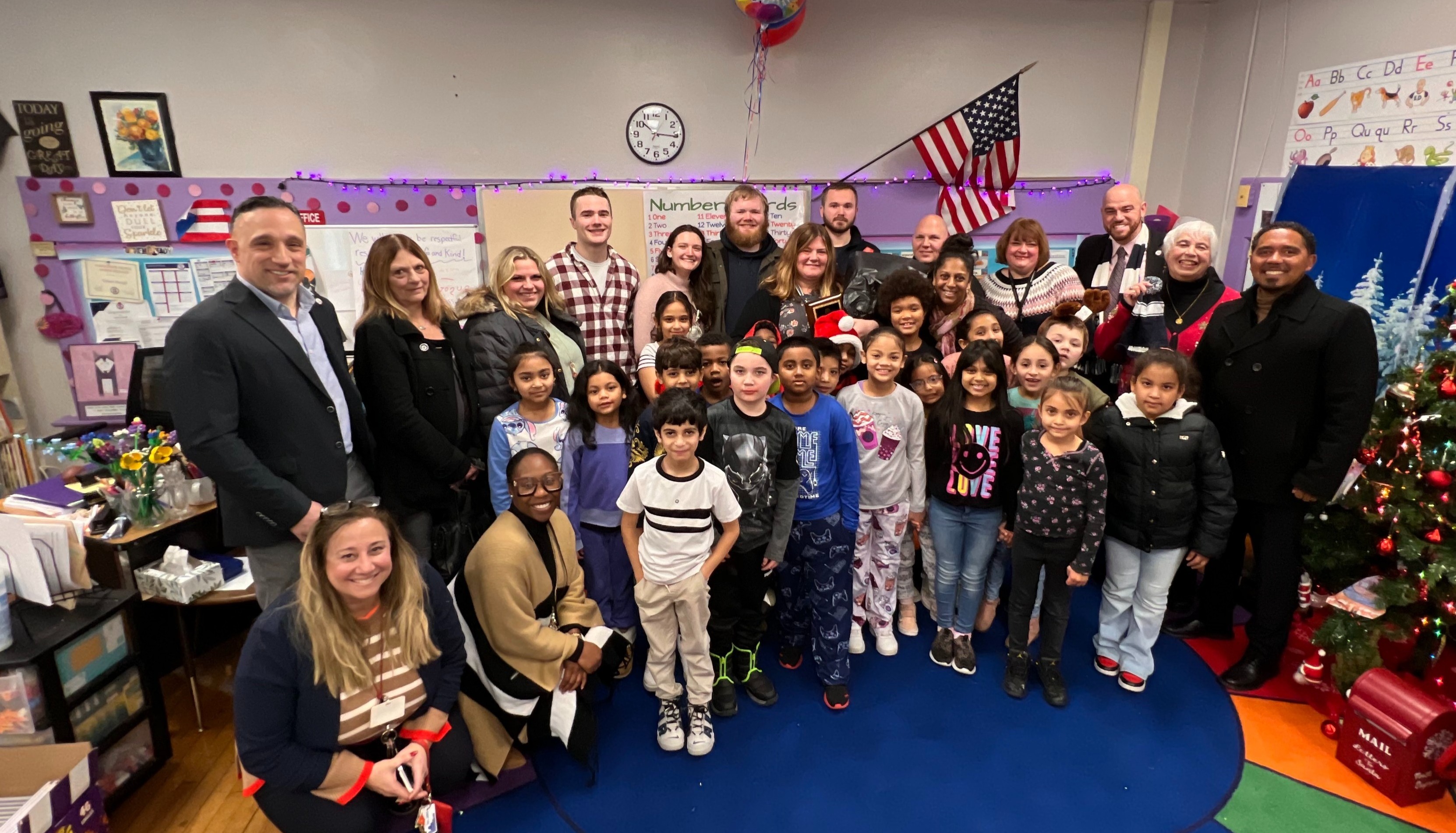 Teacher of the year group photo with students and family