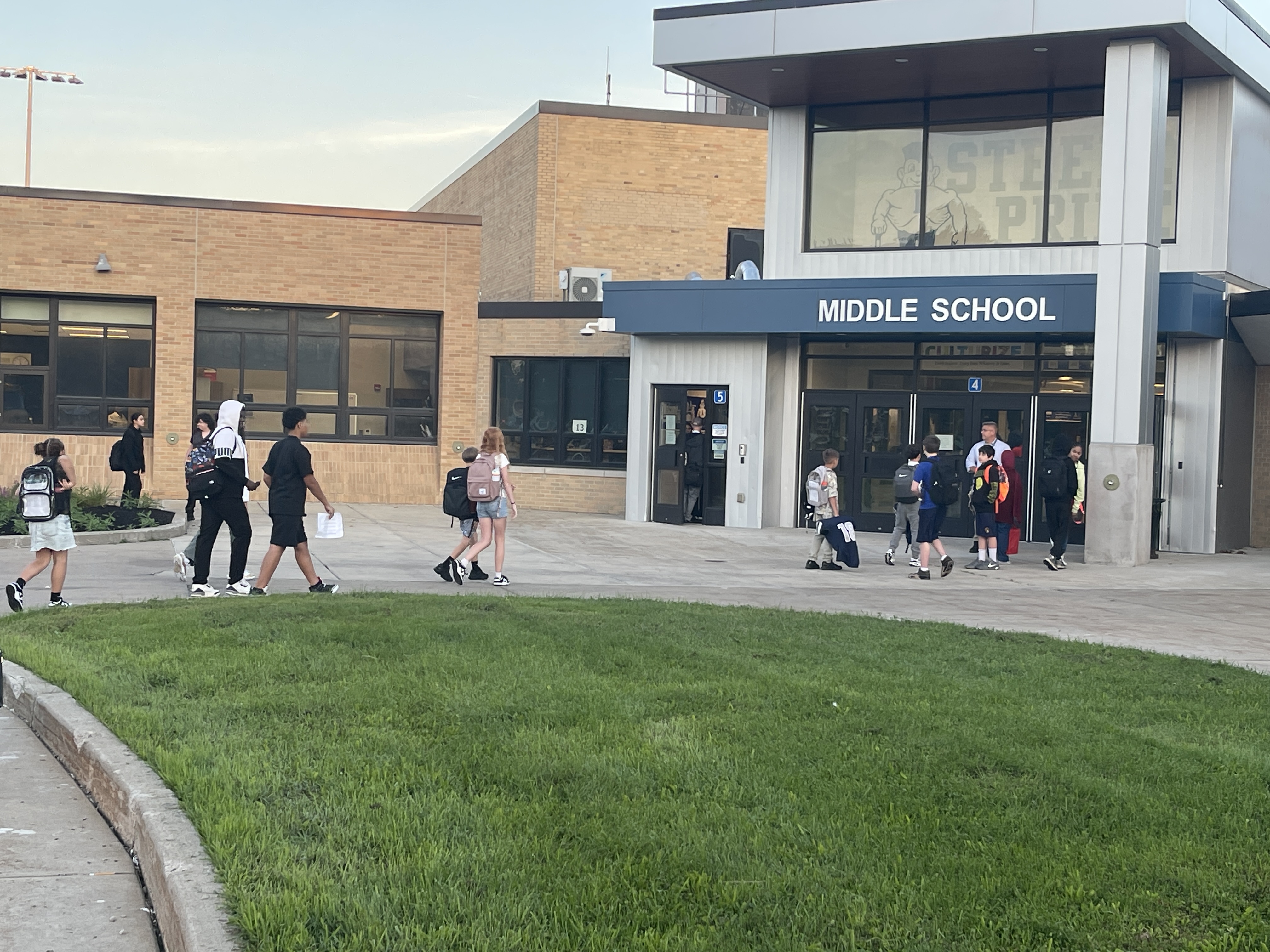 students walking in for first day of school