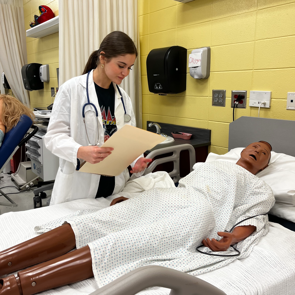 Student participating in CTAE program during a medical class