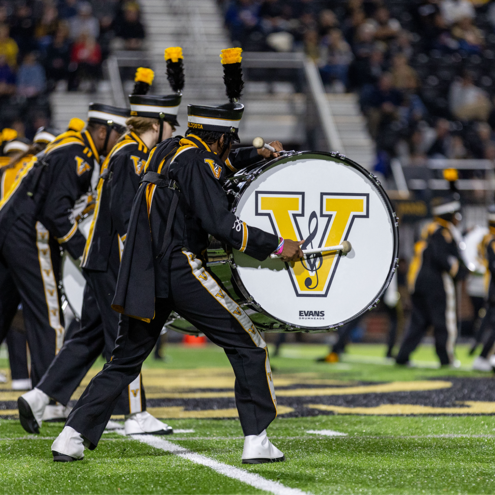 VHS Marching cats performing on football field