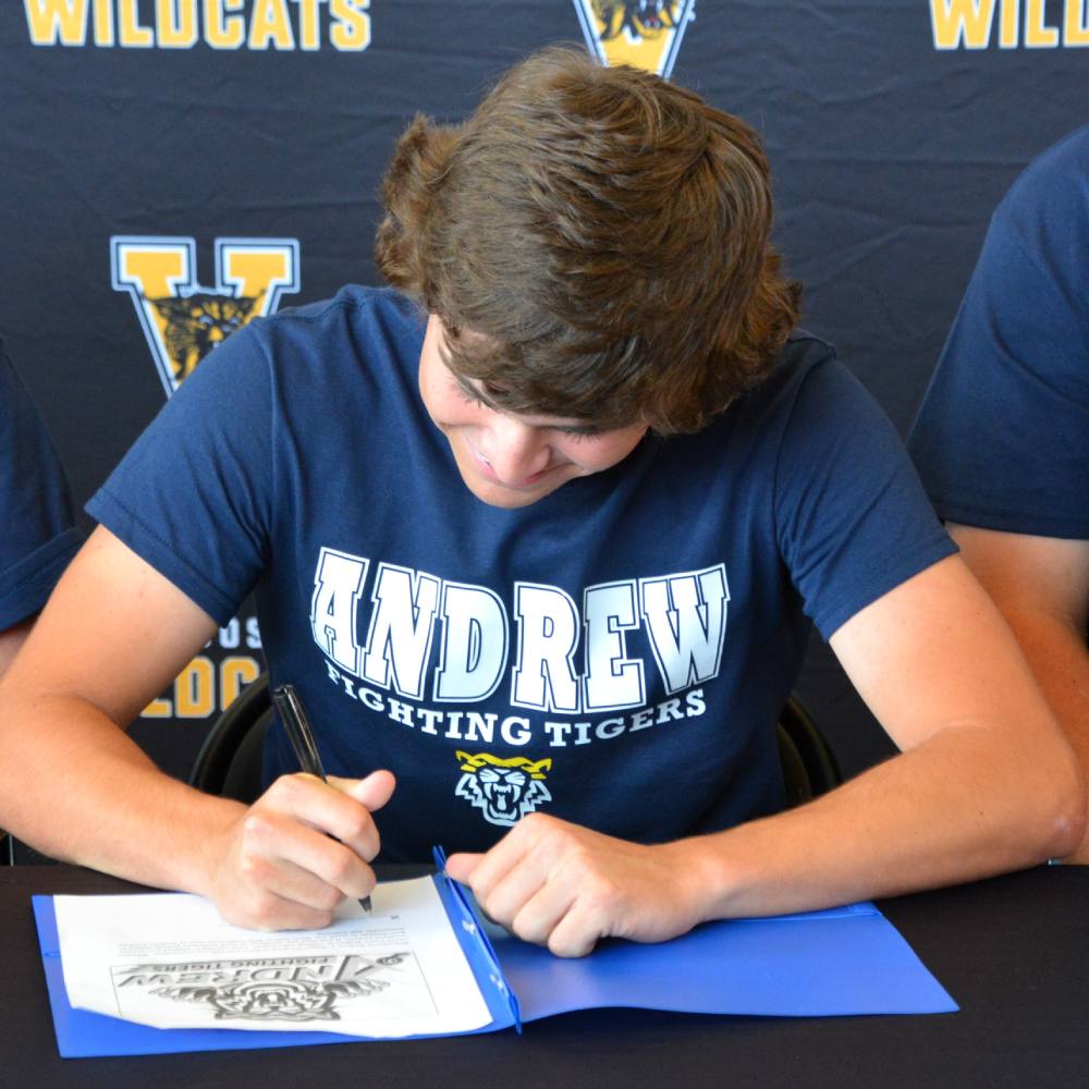 baseball student signing for scholarship