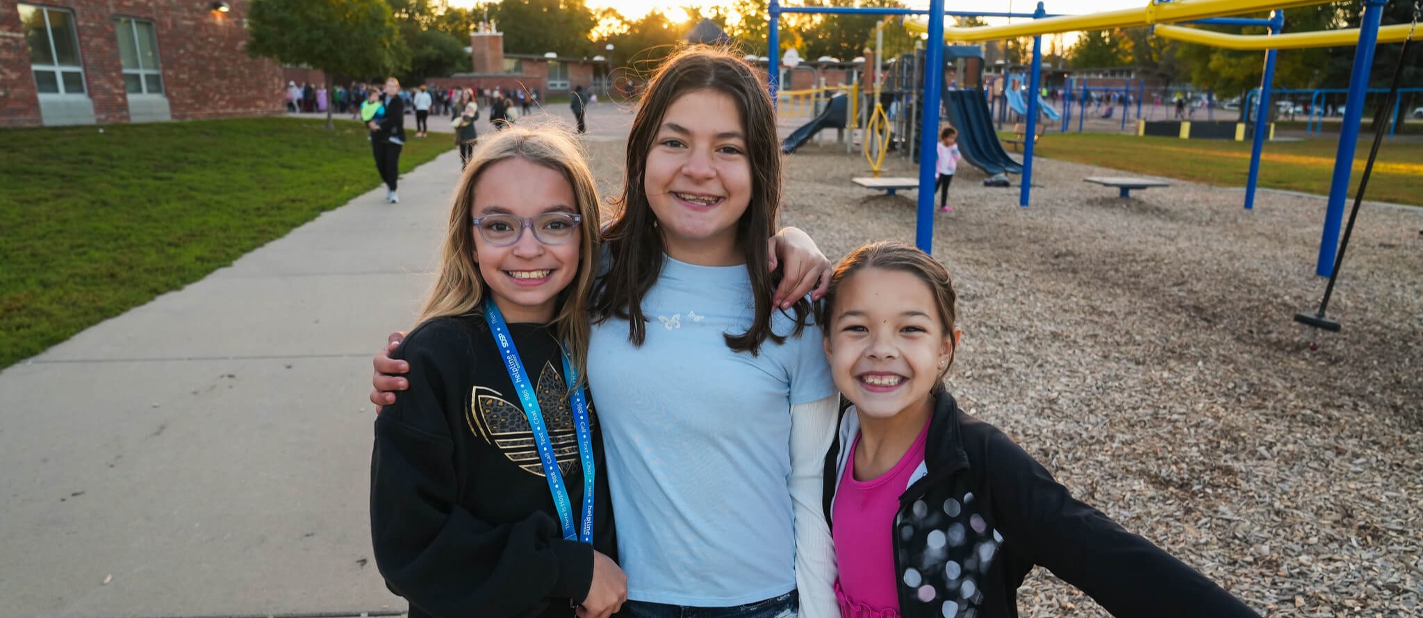 Three very happy girls before school