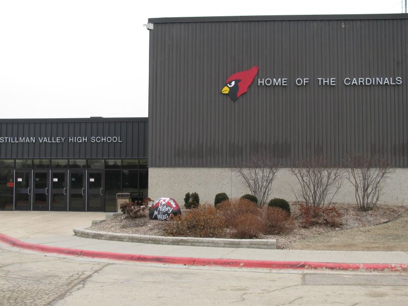 outside of gray building with cardinal logo