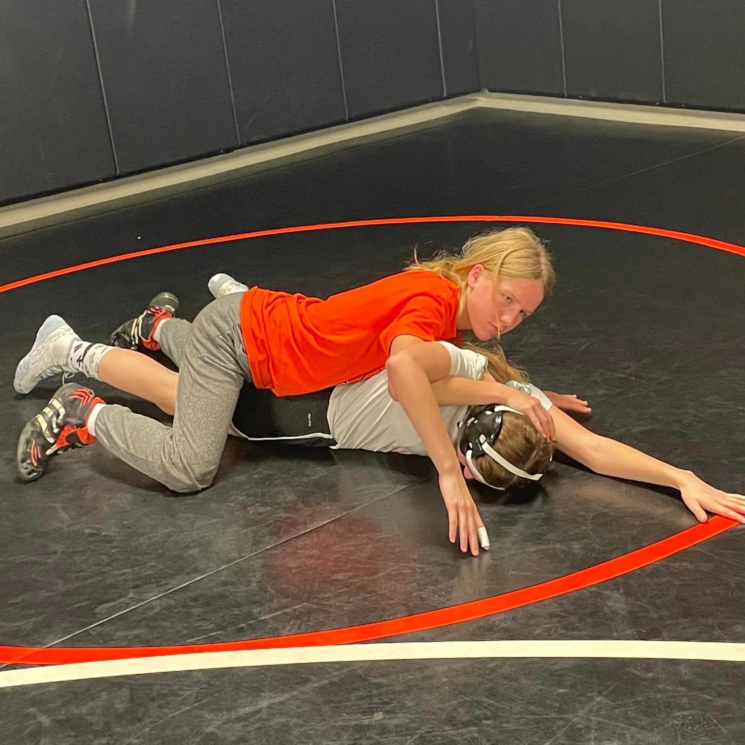 two boys wrestling