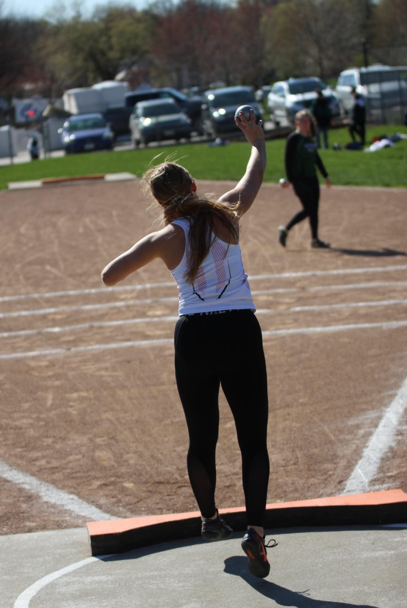 girl throwing shotput