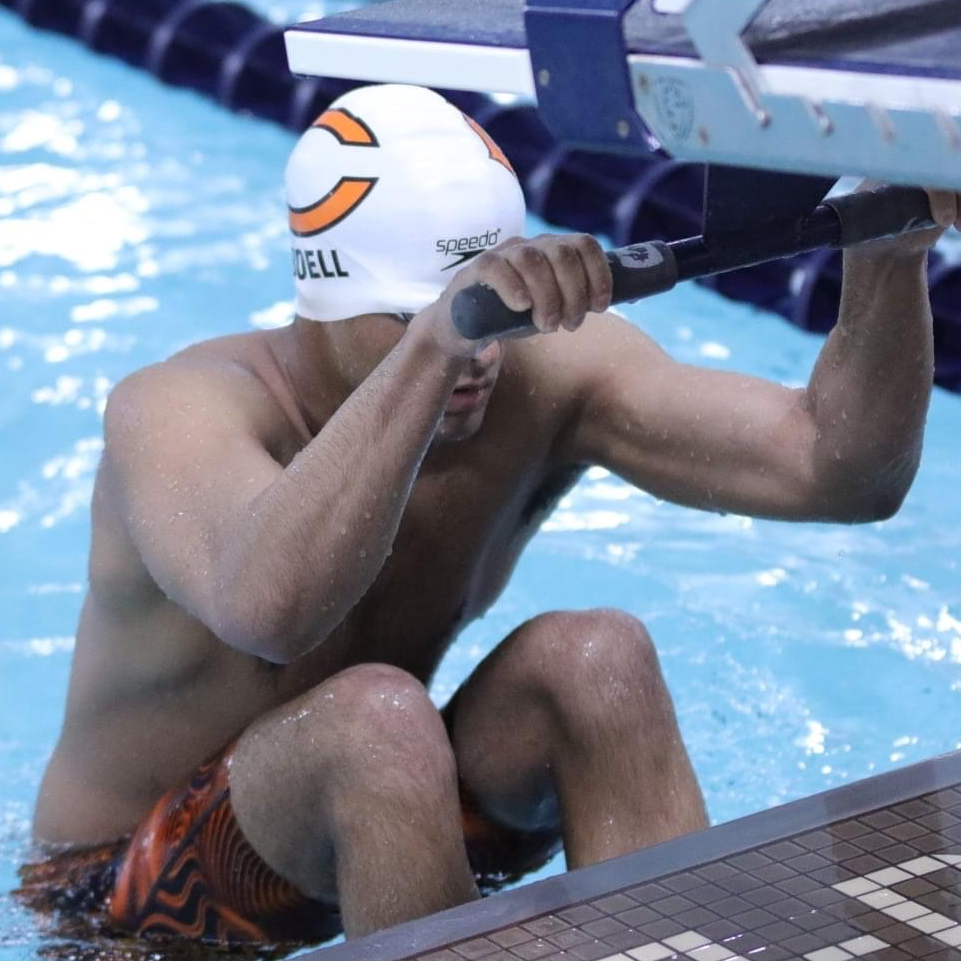 boy getting ready to do the backstroke