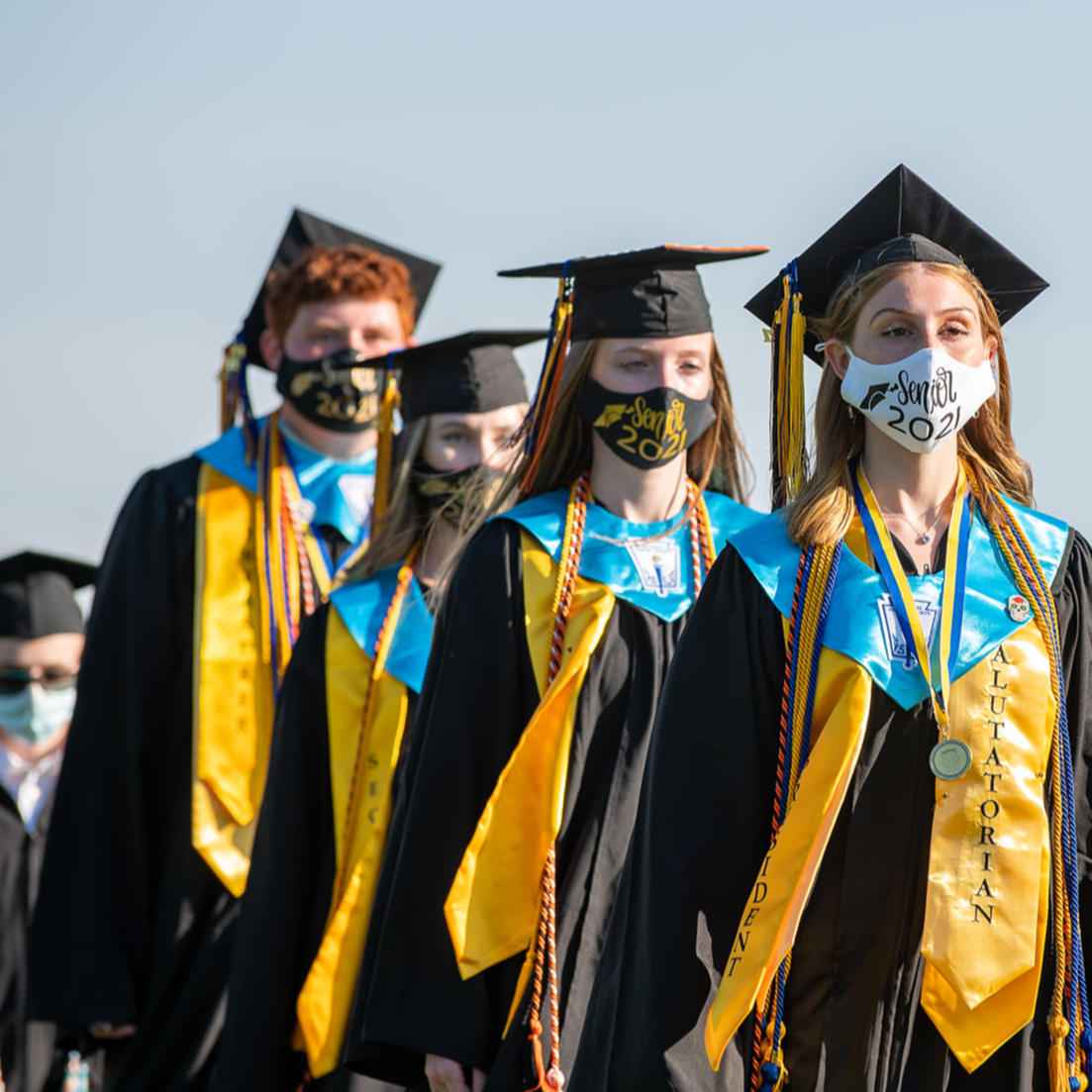 graduates marching