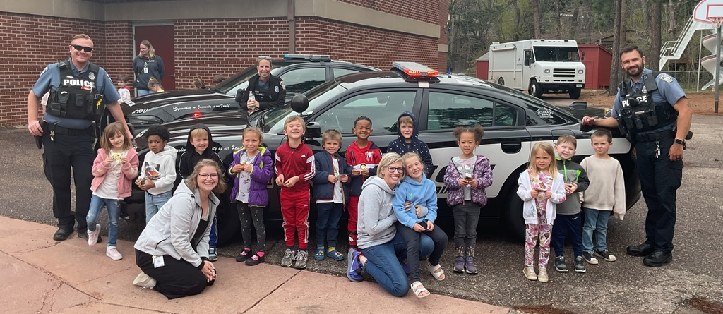Canon preschool students learning from local police officers