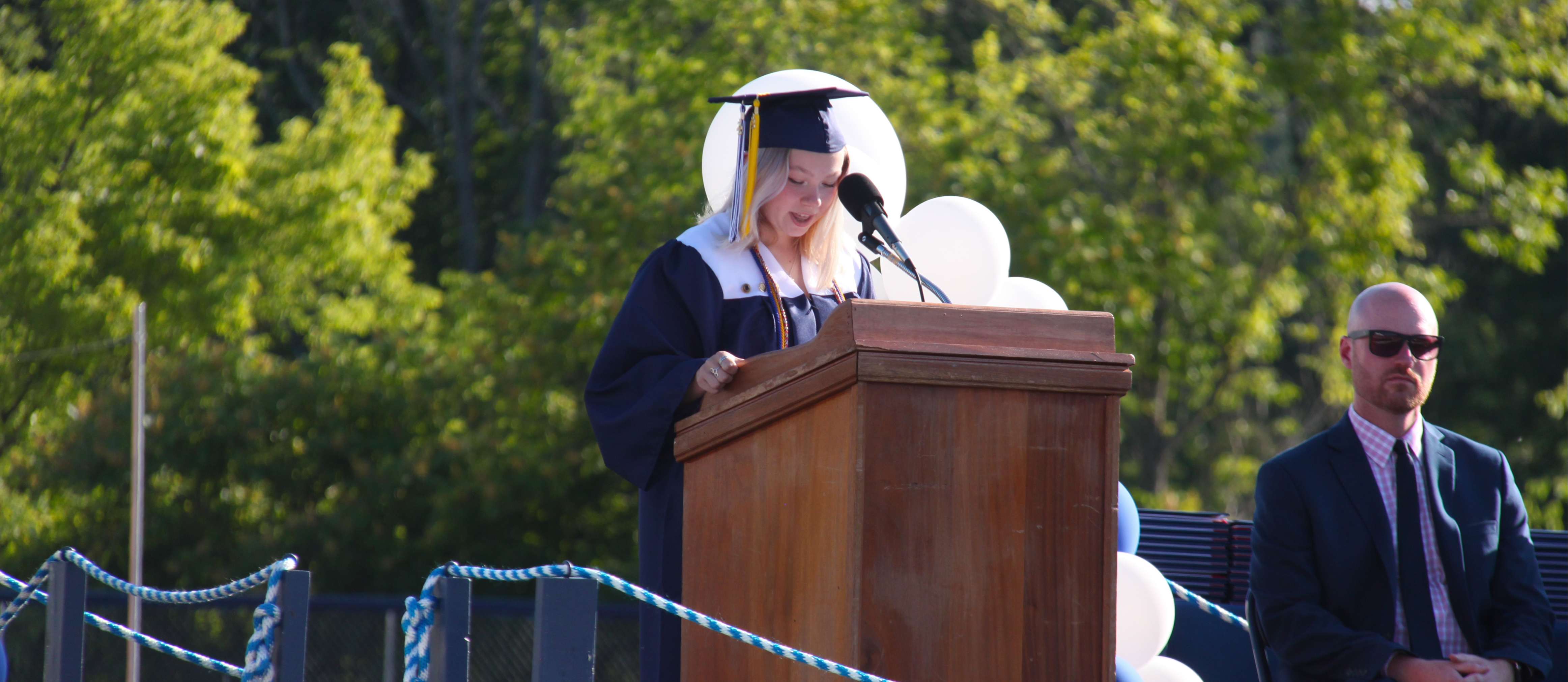 Student speaks at ceremony