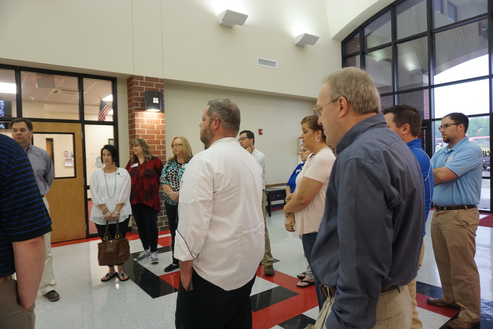 A photo of the architects visiting the facilities.