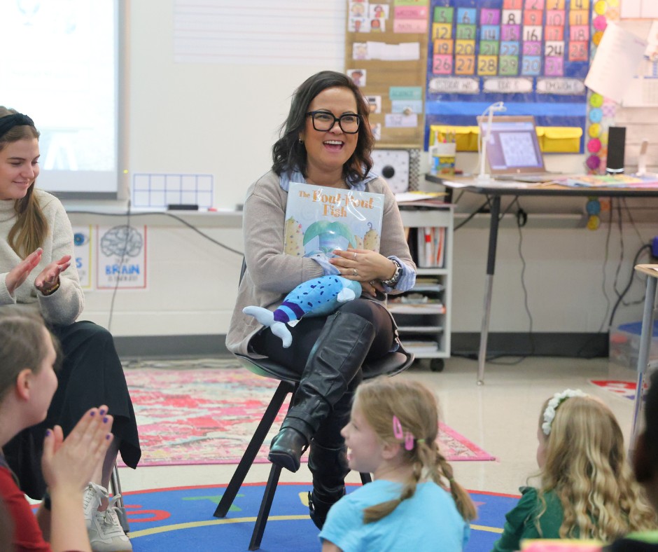 Teacher reading to students