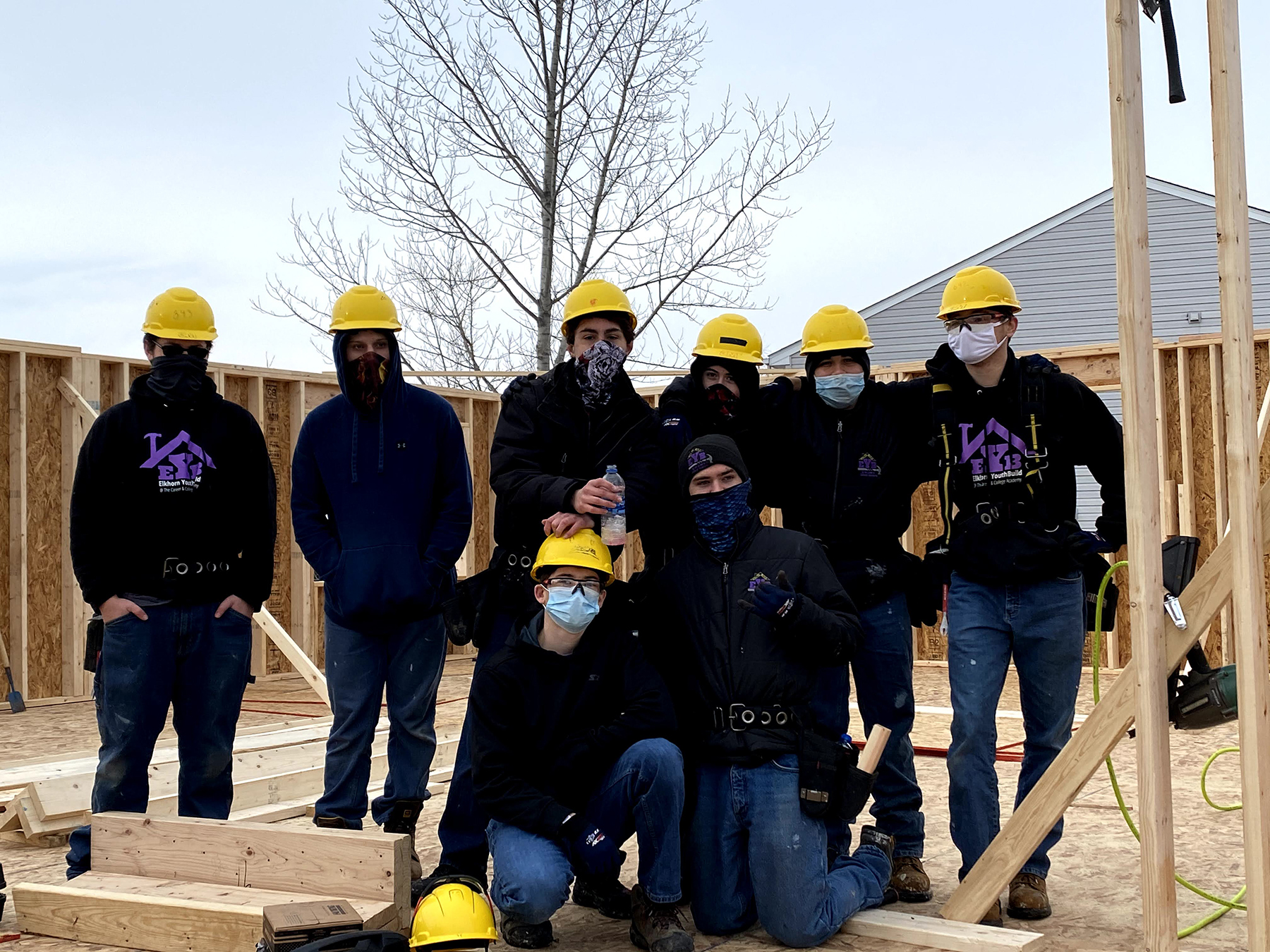 YouthBuild students posing for camera at build site