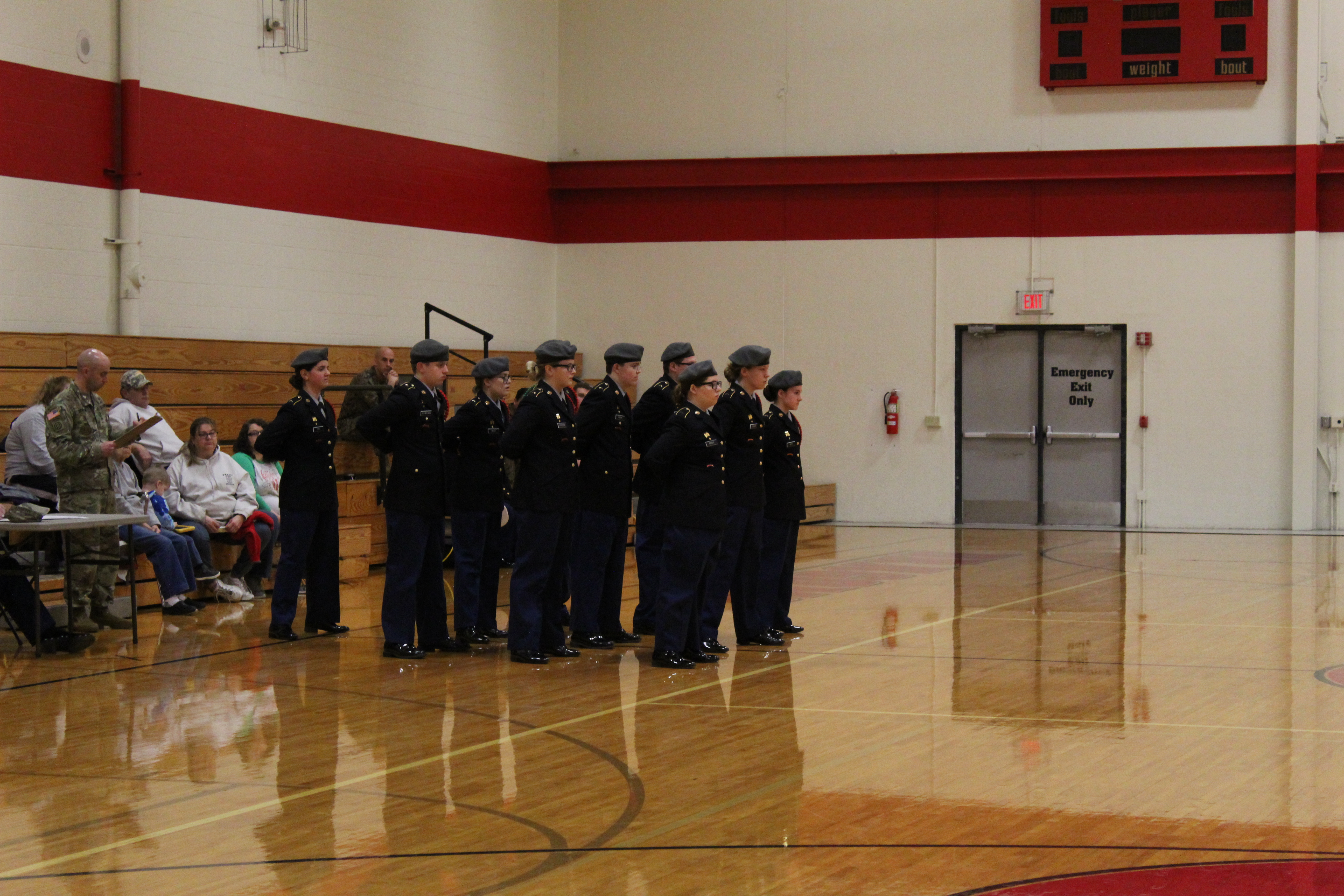 A photo of the drill team in the school gym