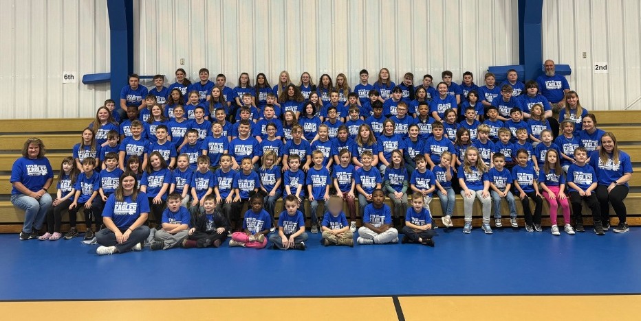 White background blue shirts with white writting