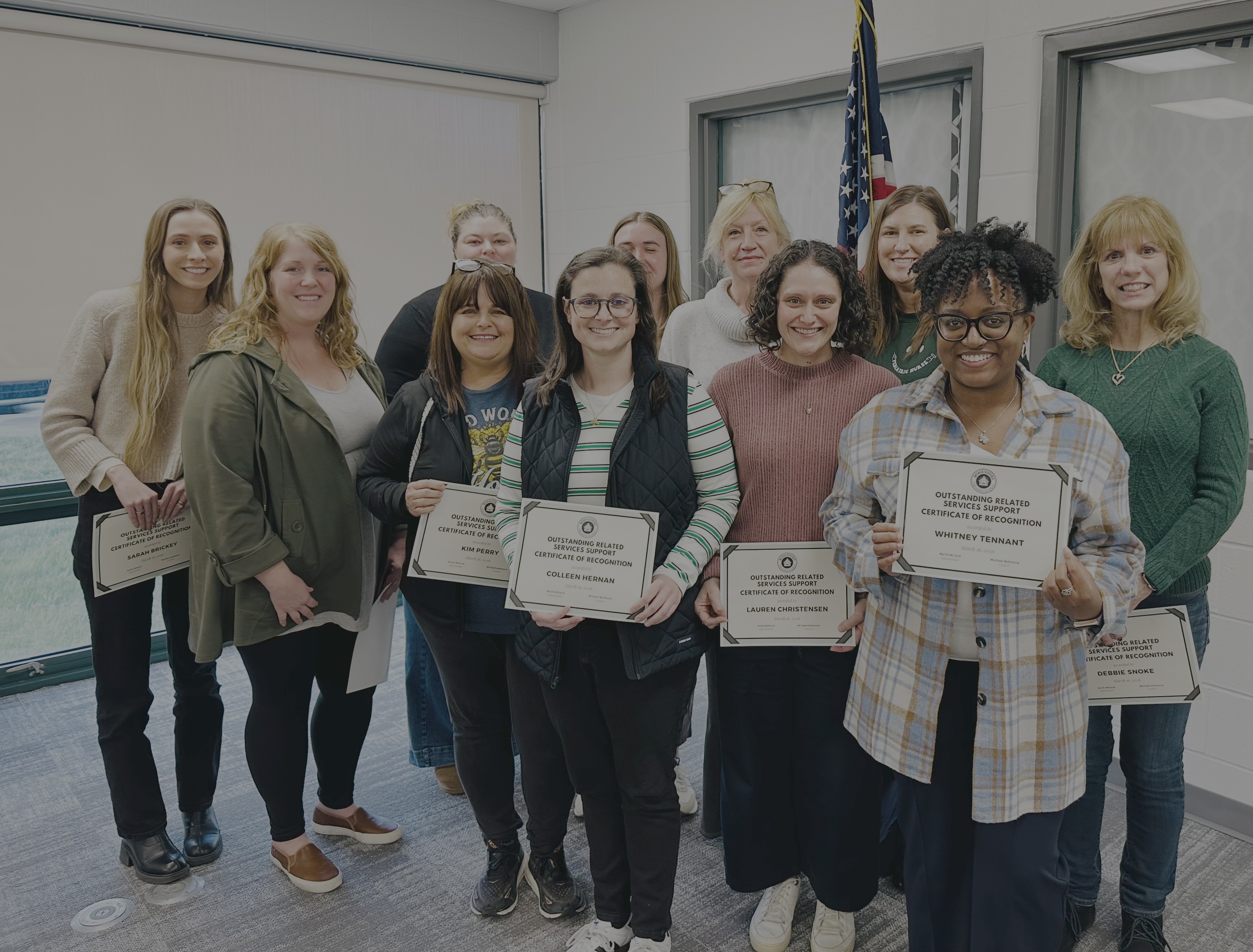 batavia related service personnel holding certificates of appreciation at the board of education meeting on 3/16/20026