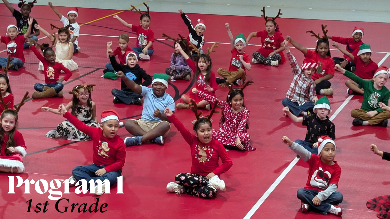 kids on floor in their holiday outfits and head gear