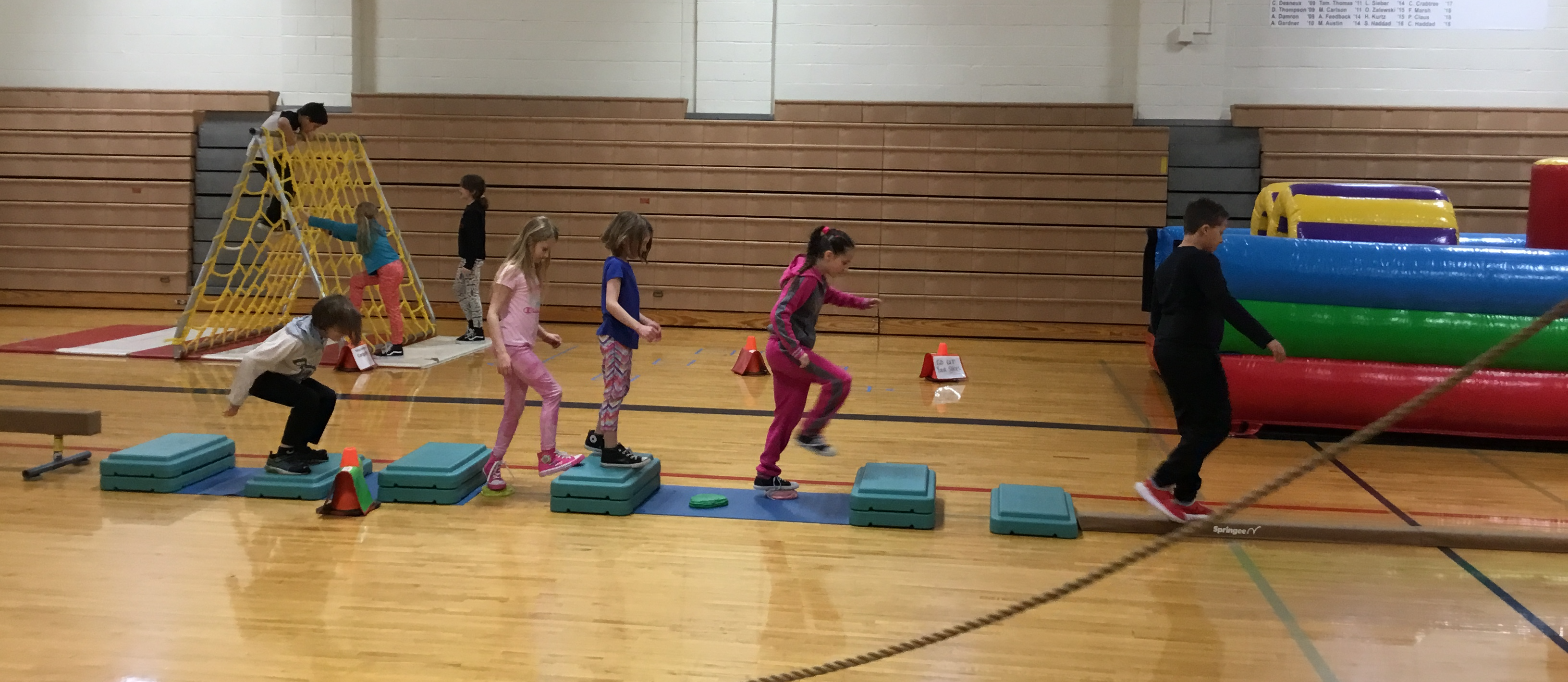Students try a Ninja Warrior course in P.E. class