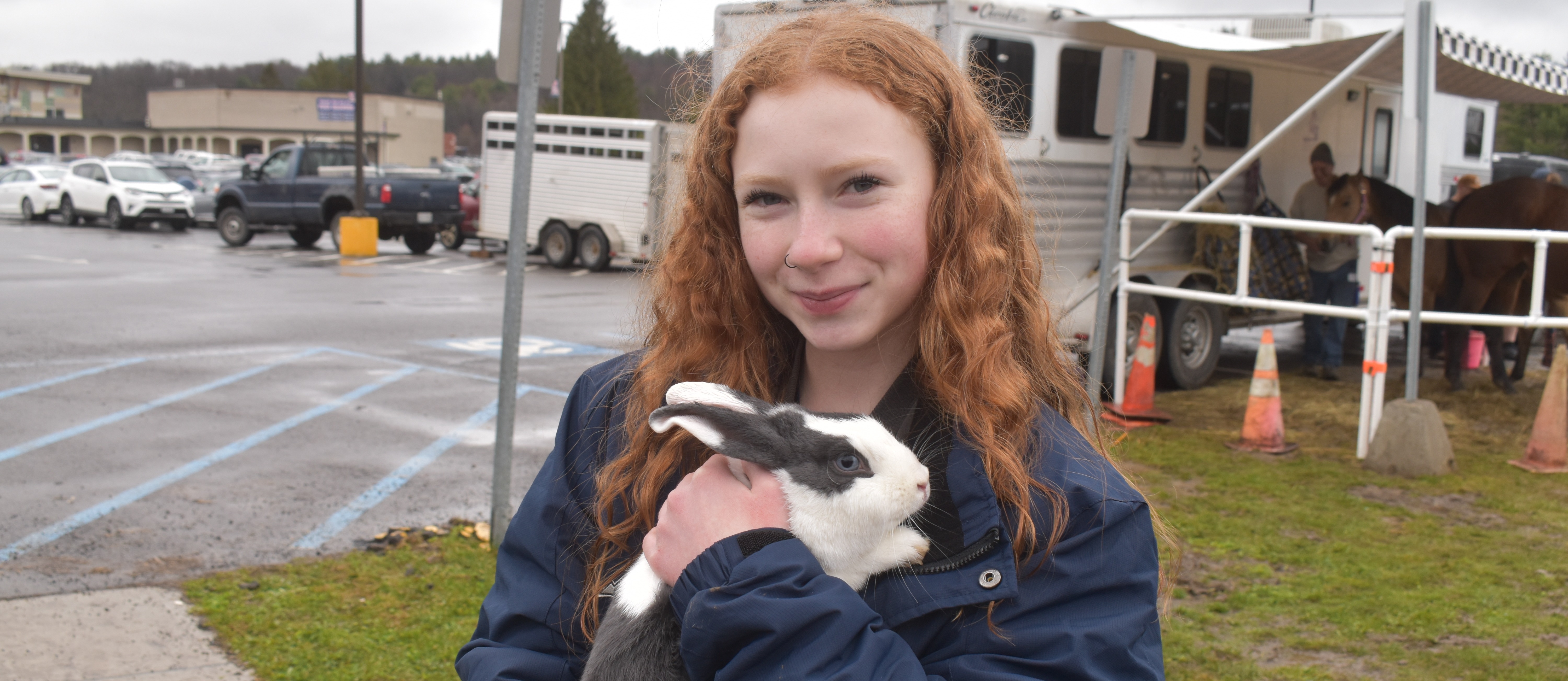 student holding bunny