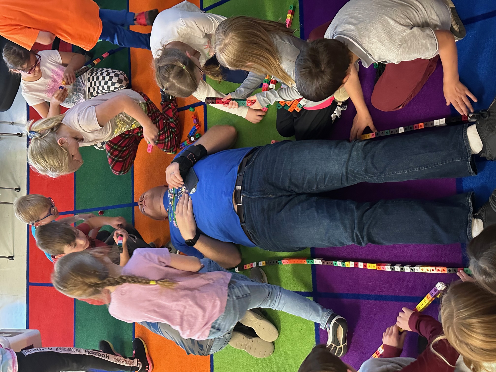 Mr. Berns' class uses unifix cubes to measure length and height.