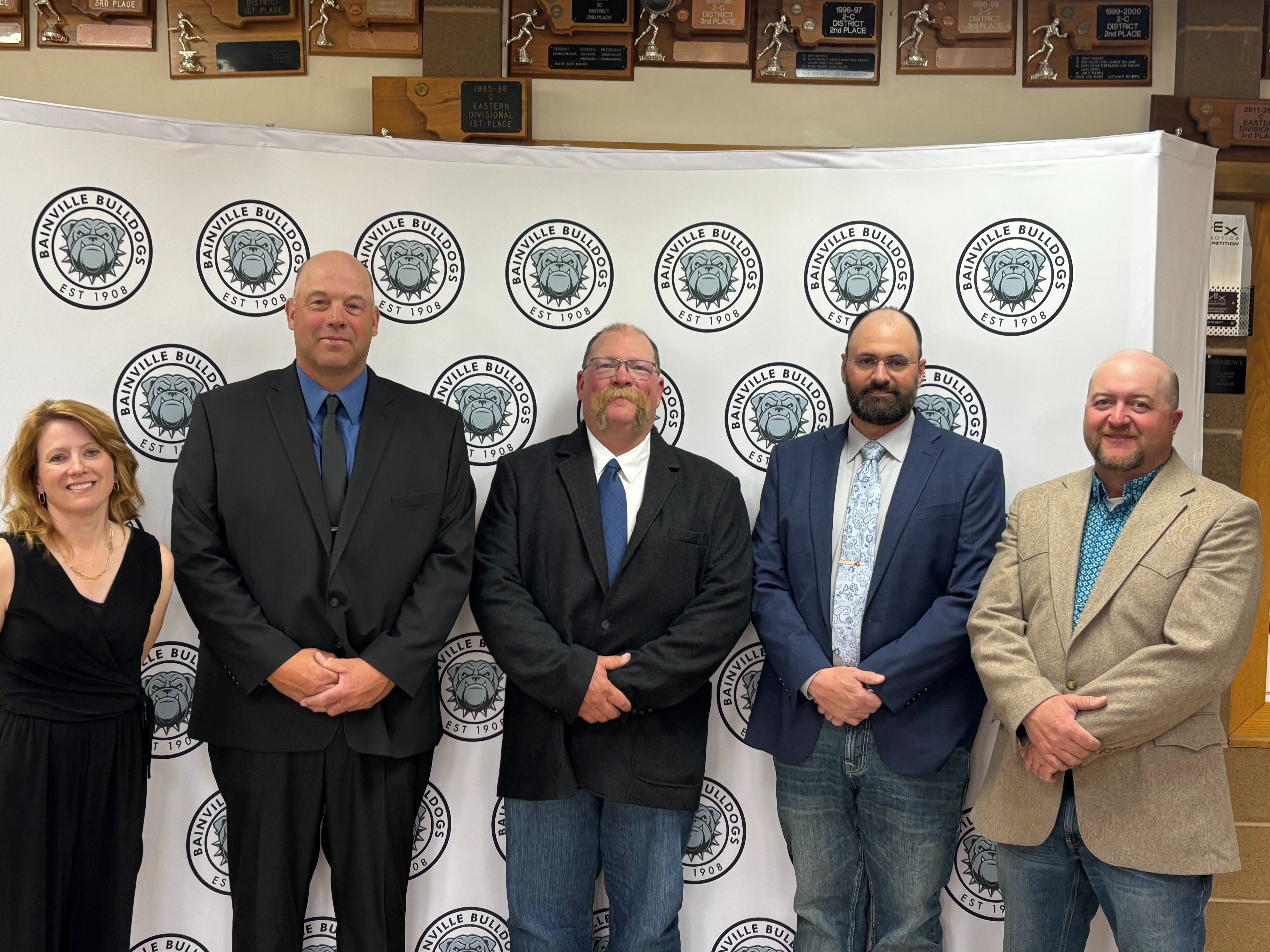 Pictured from Left to Right: Vice Chairman Chris Hansen, Clerk Kt Northington, Chairman Dana Berwick, Superintendent Darin Hannum, Trustee Neil Iversen, Principal Rhiannon Beery, Trustee Tyler Traeger Not Pictured: Trustee Sarah Harmon