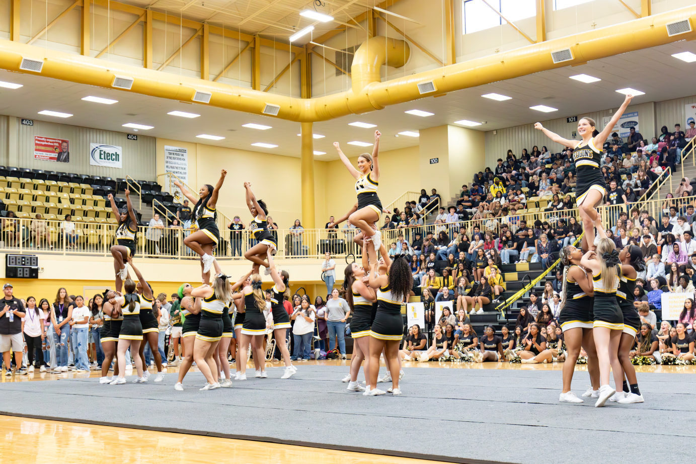 NHS cheerleaders performing at the pep rally